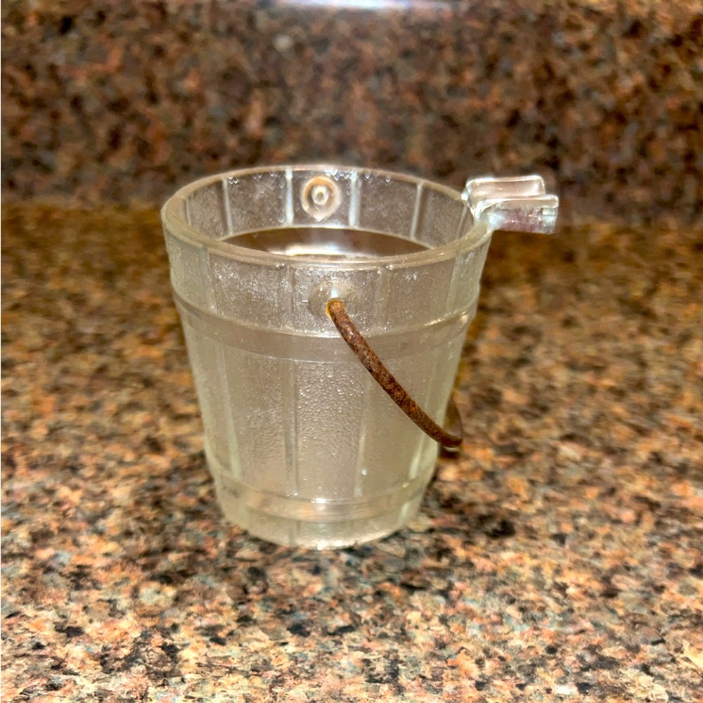 Small antique glass bucket with spout and handle